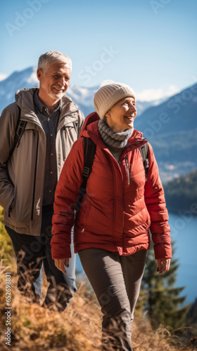 senior couple walking in the mountains