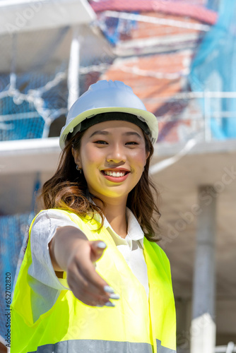 young female architect visiting her work