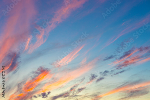 beautiful evening sky with cirrus clouds during sunset photo