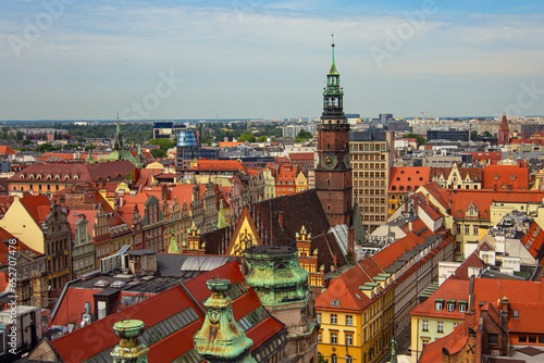 City hall and multicolored houses on the Market square at Old Town in Wroclaw, Poland. View from the Bridge of Penitents of Cathedral of St. Mary Magdalene