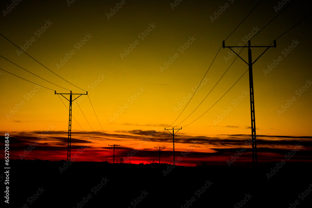 power poles against the background of the evening sky