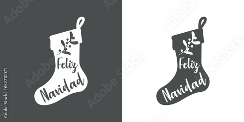 Tiempo de Navidad. Logo con palabras en texto manuscrito Feliz Navidad en español en silueta de media de navidad para su uso en invitaciones y felicitaciones	