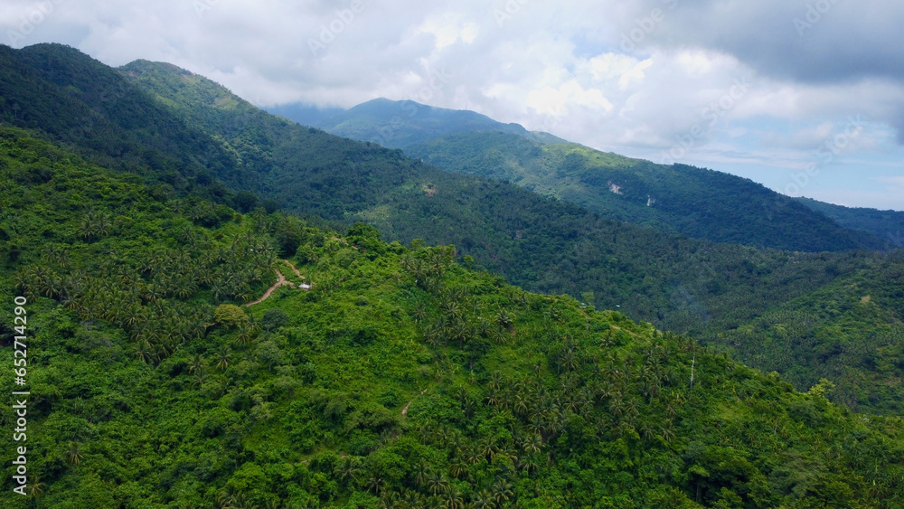 Landscape in the mountains. Cloudiness in the mountains. Fog in the mountains. Mountain tops covered with jungle and tropical rainforest among the clouds. Landscape in the mountains. Cloudiness in the mountains. Fog in the mountains. Mountain tops covered with jungle and tropical rainforest among the clouds.