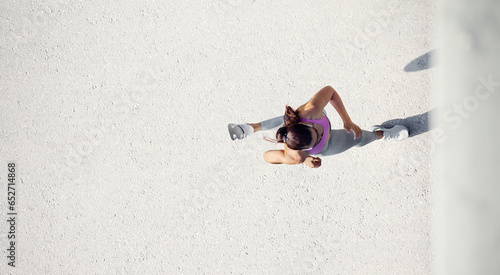  Sports background. The woman with runner on the street be running for exercise. Top view.