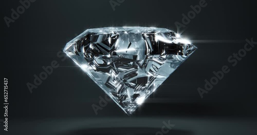 Diamond spinning in a loop against black background