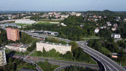 Ostrava Bridge of Pioneers drone video, Ostravice River, road junction, Ceskobratrska Street with a passing trolleybus, Czech Republic
