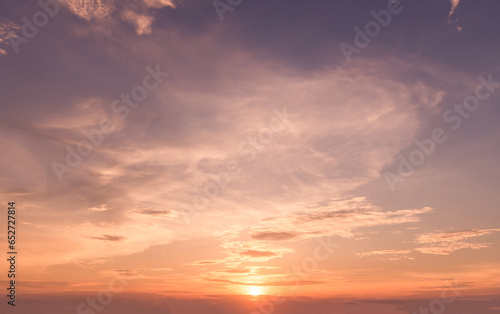 Panoramic view of sunset golden and blue sky nature background. Colorful dramatic sky with cloud at sunset.Sky background.Sky with clouds at sunset.