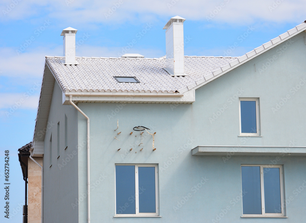 Curated visual reference: Exterior View Of A Light Blue Modern House With A Photo Inspiration