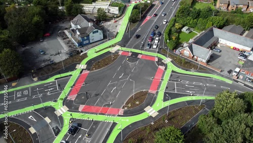 Aerial view St Helens CYCLOPS traffic optimisation sustainable junction intersection, England, Descending shot photo