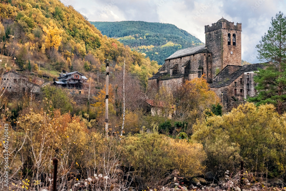 Church in Broto and autumn time.. Huesca. Aragon. Spain. Europe.