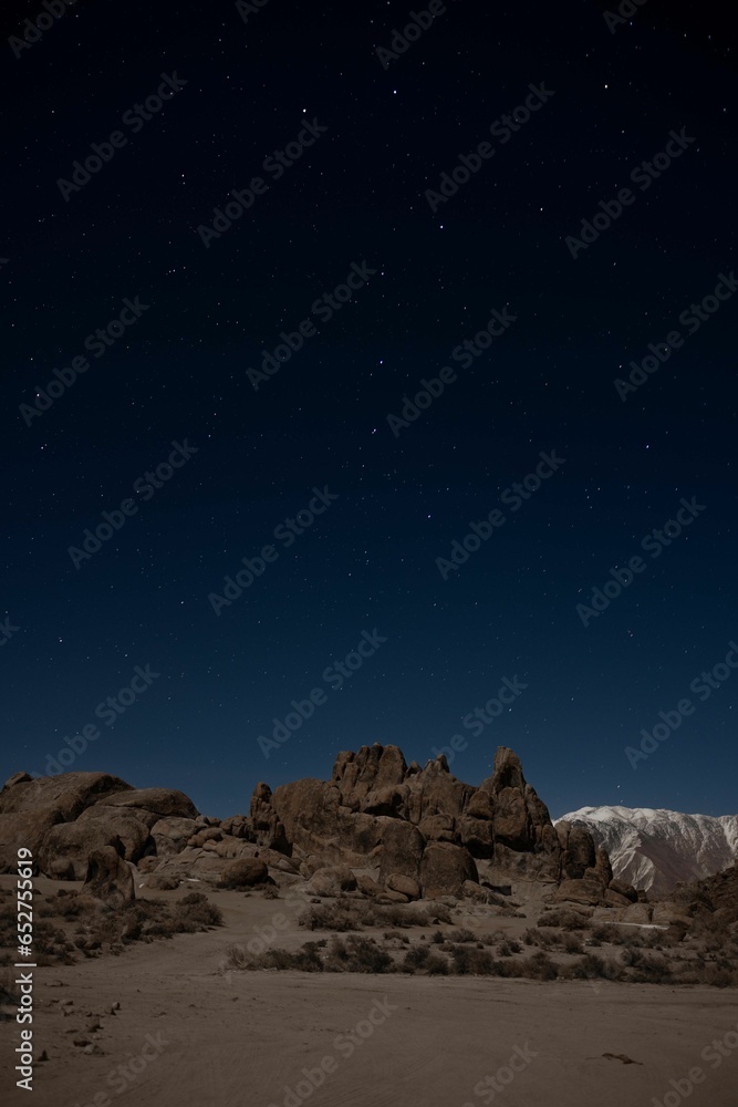 Rocky landscape with a beautiful starry sky in the background