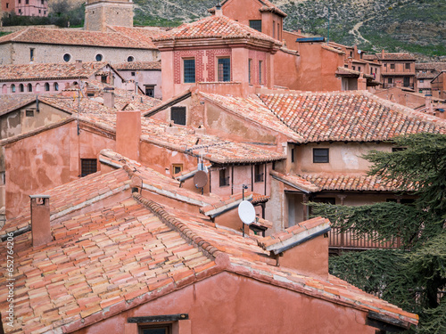 Roofs of the ancient ruined buildings in the neighbourhood photo