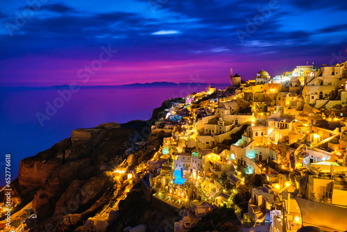Obraz na płótnie Oia village, windmills, Santorini island, Greece at colorful sunset w salonie
