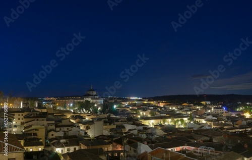 Panoramic view of an area of the city of Toledo at night with its illuminated cases.
