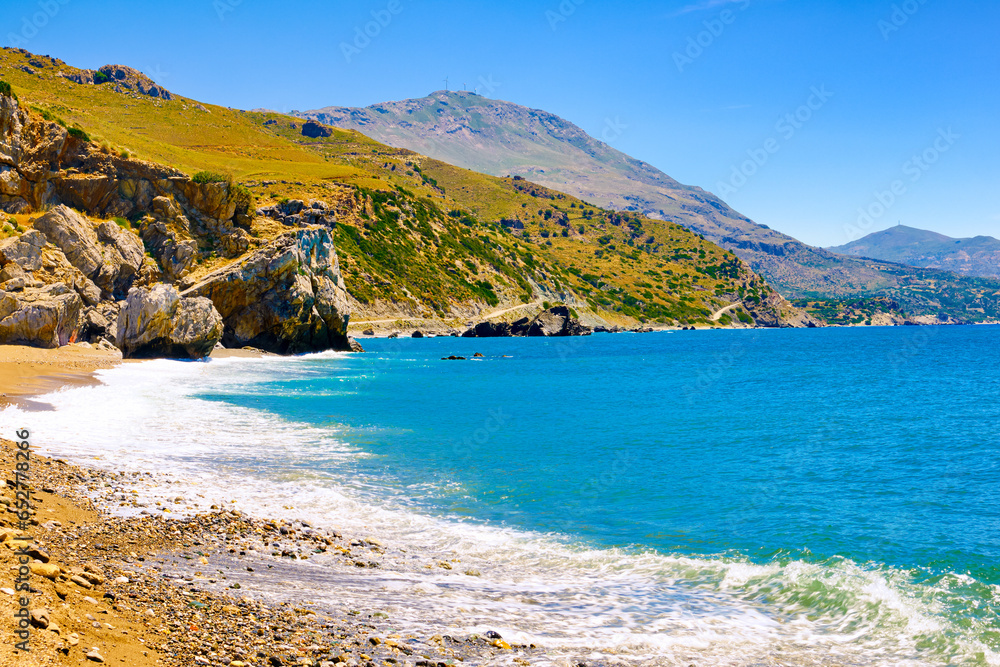 Panorama of sunny day at Preveli beach, Crete island, Greece.