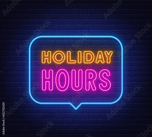 Holiday Hours neon sign in the speech bubble on brick wall background.