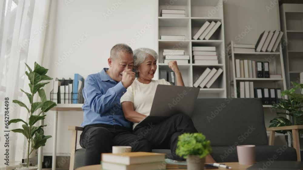 Elderly old couple lover in living room for video calling on mobile to their child's with full of happiness and love. Elderly old couple lover in living room for video calling on mobile to their child's with full of happiness and love.
