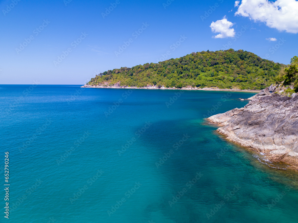 Aerial view seashore with mountains at Phuket Thailand, Beautiful seacoast view at open sea in summer season, Nature recovered Environment and Travel background