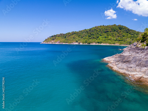 Aerial view seashore with mountains at Phuket Thailand  Beautiful seacoast view at open sea in summer season  Nature recovered Environment and Travel background