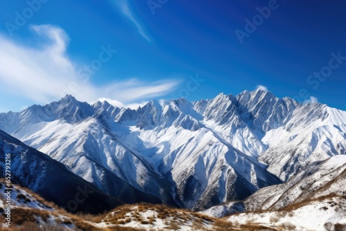 A breathtaking view of a snow-capped mountain range © GenieStock