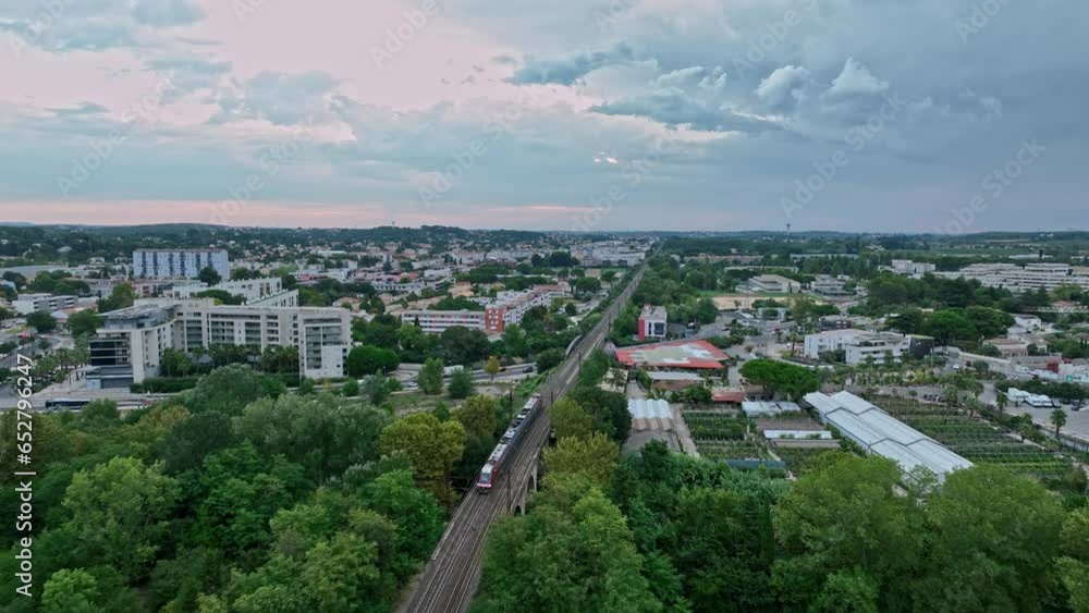 Aubes from above, capturing the dance of trains at sunrise.
Aubes from above, capturing the dance of trains at sunrise.
