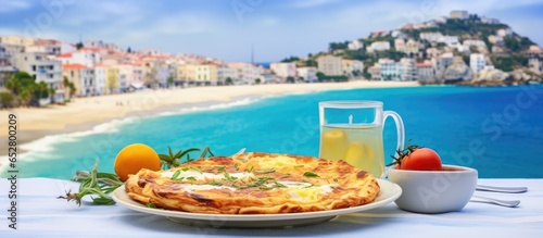 Breakfast in Greece omelet and yogurt near the Mediterranean sea