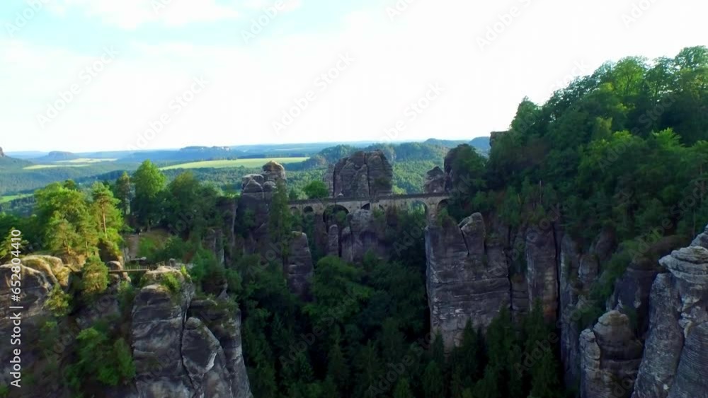 Wide shot flying near Bastei Bridge in Germany Wide shot flying near Bastei Bridge in Germany