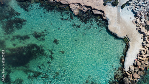 Aerial top down drone view of sea bay beach. Abstract nature water background
