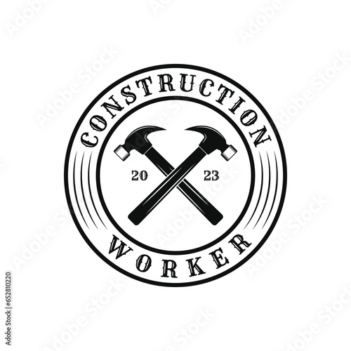 Construction worker logo design vintage retro label with hammer crossed