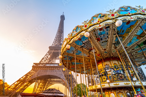 Historical Carousel of the Eiffel Tower. Morning photography at sunrise time. Paris, France