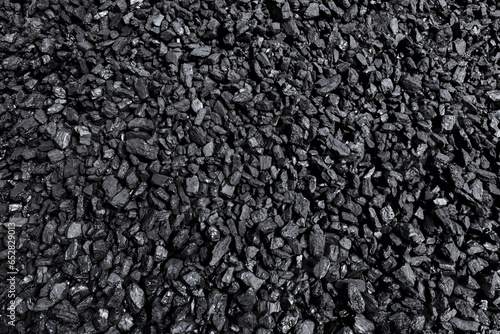 Black coal from the mine. Stone ore background. Energy industry. Solid fuel.