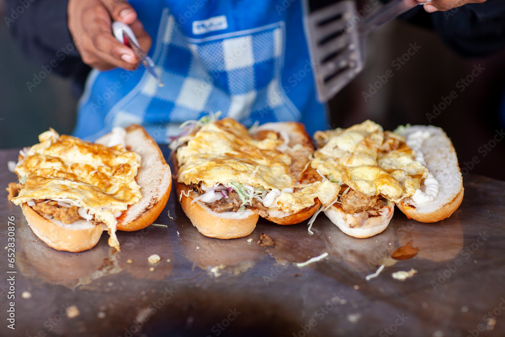 People Making Bread With Fried Egg In Pakistan. People Making Bread With Fried Egg In Pakistan.