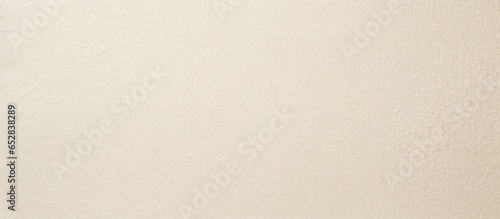 Light rough textured background with copy space featuring spotted white beige paper