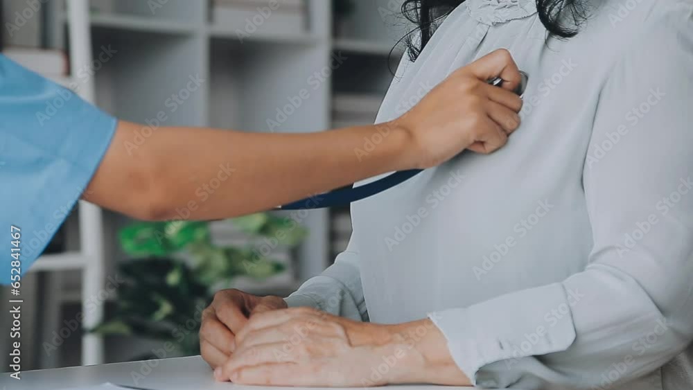 close up doctor, Asian doctor talk with old female patient about disease symptom, doctor use stethoscope listening lung of patient, elderly health check up, happiness hospital