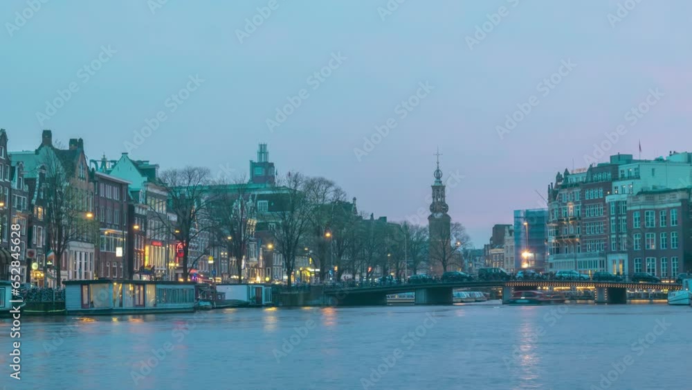 Amsterdam Netherlands time lapse 4K, city skyline day to night timelapse at canal waterfront Amsterdam Netherlands time lapse 4K, city skyline day to night timelapse at canal waterfront
