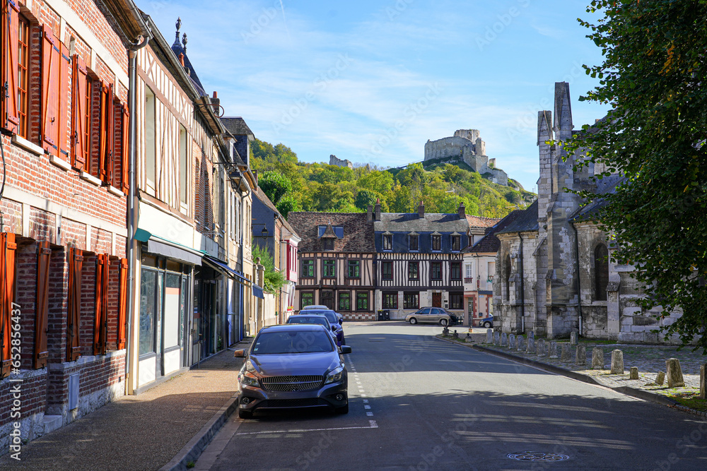 Timbered houses in the Norman town of Les Andelys, overlooked by the ruins of Château Gaillard, a medieval castle built by the King of England Richard the Lionheart in Normandy, France