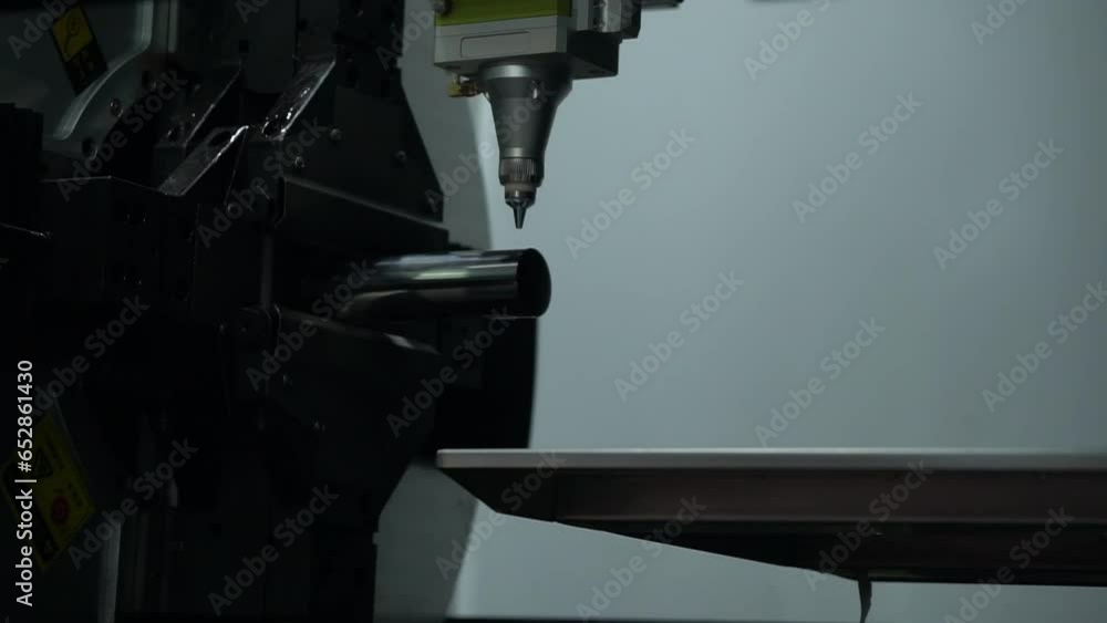Close up scene the fiber laser cutting machine cutting machine cut the stainless steel tube. Close up scene the fiber laser cutting machine cutting machine cut the stainless steel tube.
