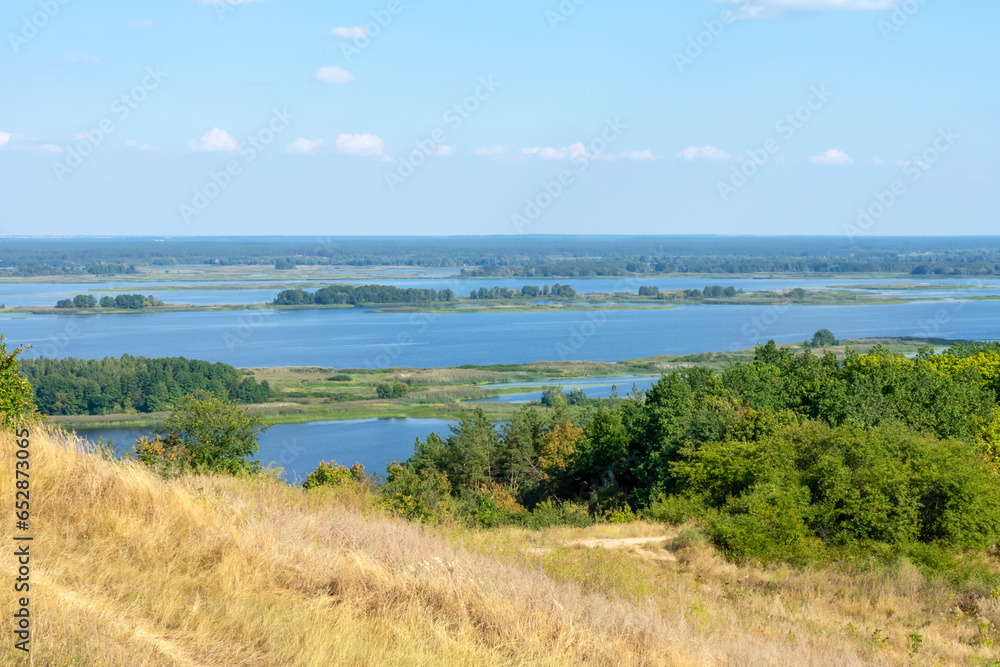 Landscape of Dnieper river on sunny day near Vytachiv, Ukraine
