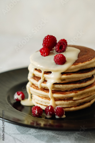 Pancakes with raspberries and cream