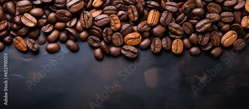 Rustic slate background with coffee beans