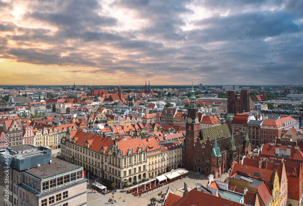 Aerial view of the Old Market square in Wrocław, Poland (Wrocławski Rynek). Panoramic cityscape at sunset with dramatic sky