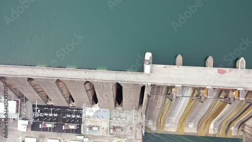 Hydroelectric power plant with blue and green water. Bajina Bashta. Aerial. Summer. Serbia. Drina river. 