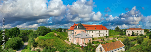 View of old castle against the blue sky in Zolochiv, Lviv region in Ukraine. photo