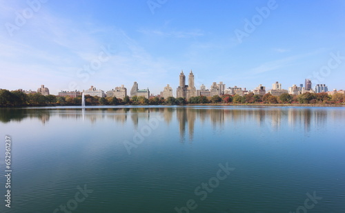 View of metropolitan skyline across an expanse of water © Brian