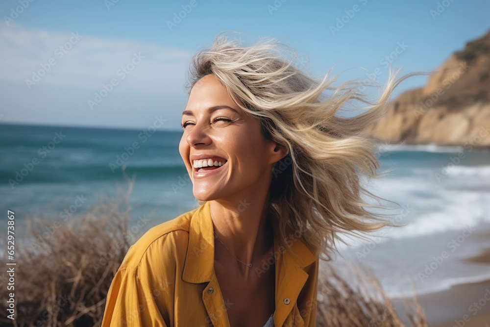 A smiling woman 30 years old looks into the distance and enjoys life after recovering from cancer A smiling woman 30 years old looks into the distance and enjoys life after recovering from cancer