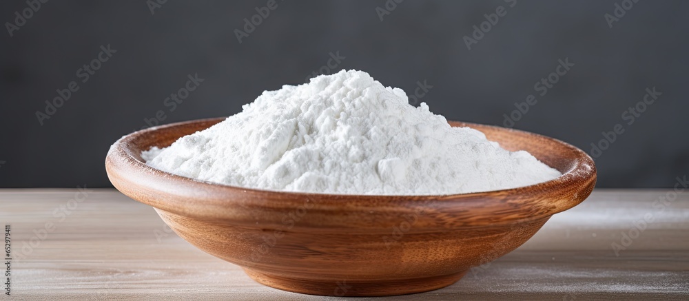 Tapioca starch in a bowl on a wooden board