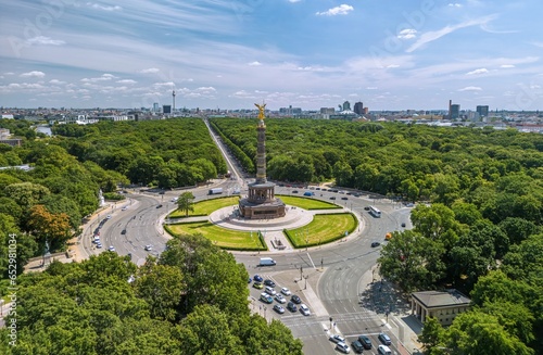 The drone aerial view of The Victory column in Berlin Tiergarten, at sunny summer day Berlin, Germany. Siegessaule was designed to commemorate the Prussion victory in the Prussian-Danish War.
