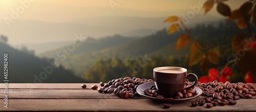Fresh organic red coffee beans on a wooden table with copy space