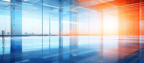 Modern office interior with abstract blue background and vibrant orange light effect