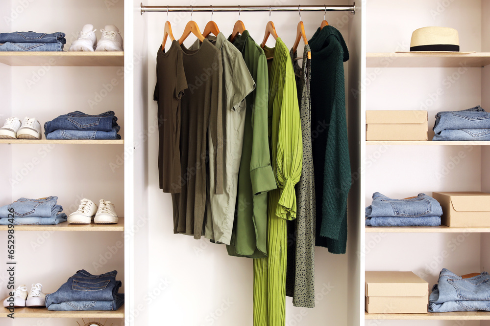 Stylish clothes with shoes in boutique Stylish clothes with shoes in boutique